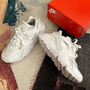 Never worn white Nike air huaraches.  Size W6.5 M5